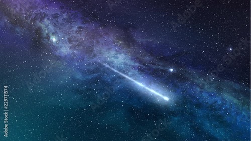shooting star in a blue starry night sky
