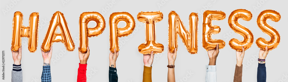 Fototapeta premium Orange alphabet balloons forming the word happiness