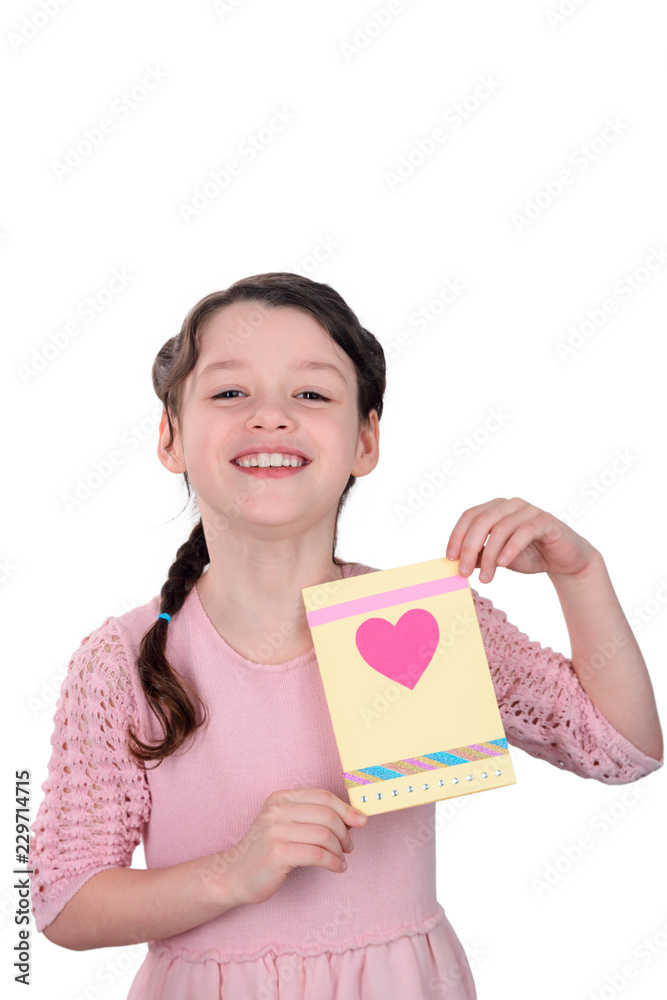 Young lady showing handmade card Young lady showing handmade card