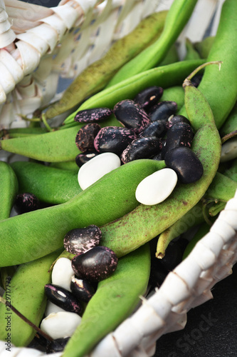 fresh green beans in a wicker basket  closeup