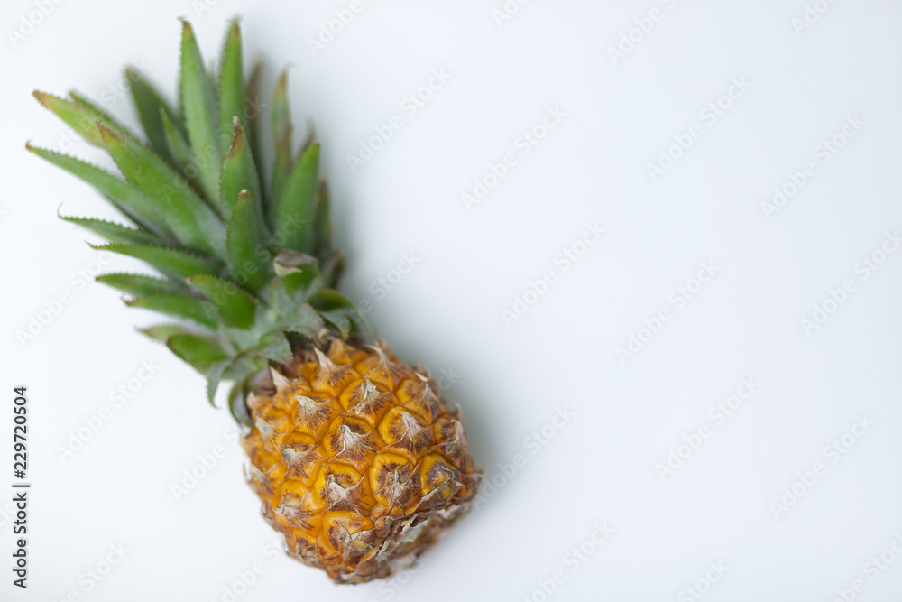 Fototapeta premium Fresh pineapple with leaves. Isolate. On white background. The view from the top.