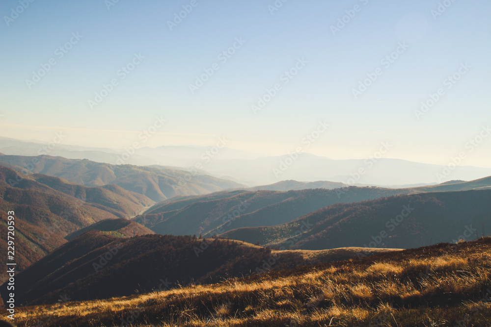 Ukrainian Carpathians in autumn time. Warm colored green leaves. the spirit of adventure Authentic views. The beauty of the earth. Forests and mountains