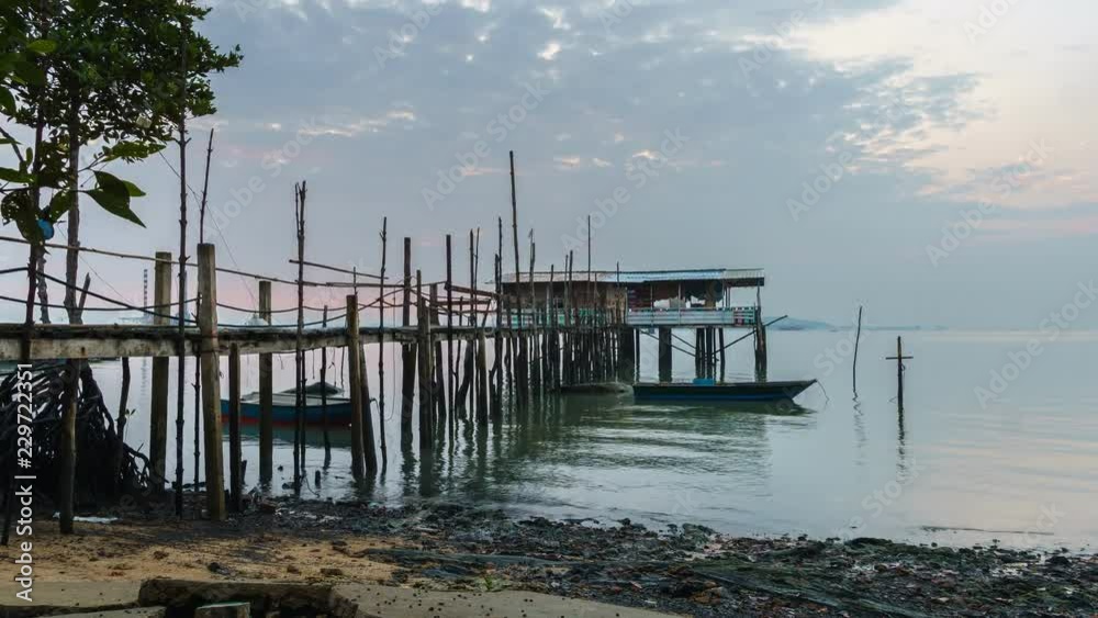 Sunrise Scene At Fishermen Jetty At Malaysian Fishing Village. Time Lapse Pan Up Sunrise Scene At Fishermen Jetty At Malaysian Fishing Village. Time Lapse Pan Up
