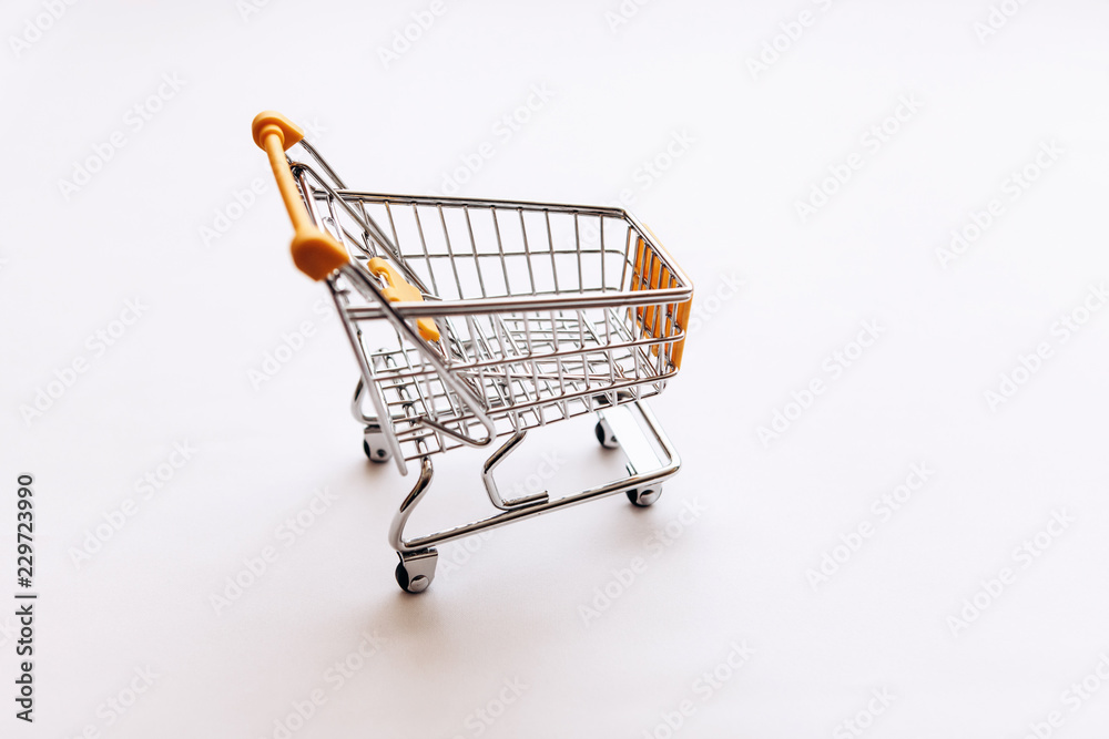 Empty cart for products and goods on a white background. Empty cart for products and goods on a white background.