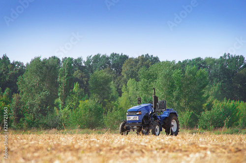 mini tractor on the field