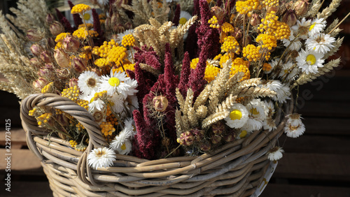 Basket of dried wild flowers in the flowers bar.