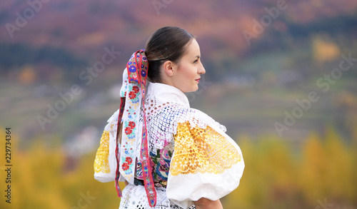Young beautiful slovak woman in traditional costume