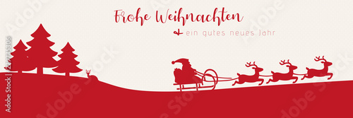 Weihnachtsgruß auf einer Schneelandschaft mit Weihnachtsmann und Rentieren