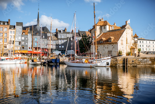 Landscape view of the harbour in Honfleur, famous french town in Normandy, during the morning light