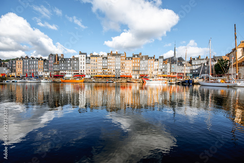 Landscape view of the harbour in Honfleur, famous french town in Normandy, during the morning light