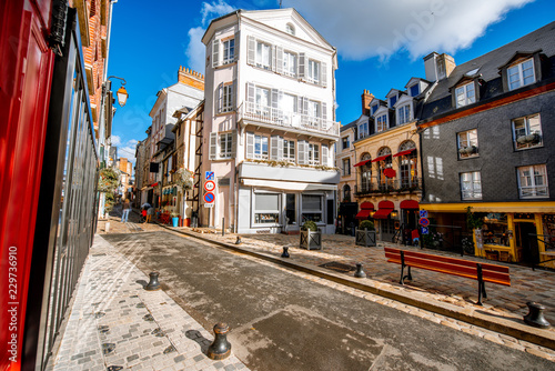 Street view with beautiful old buildings in Honfleur, famous french town in Normandy © rh2010