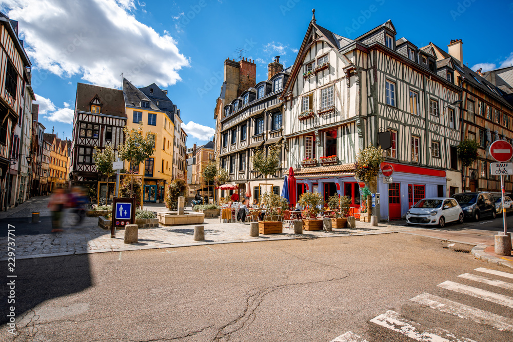 Cozy square with beautiful buildings and cafes in Rouen city, the capital of Normandy region in France