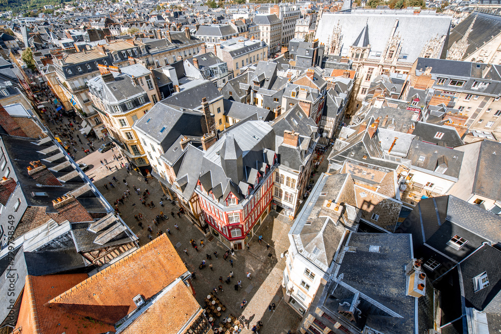 Top view on the rooftops of the old town of Rouen city during the sunny day in Normandy, France