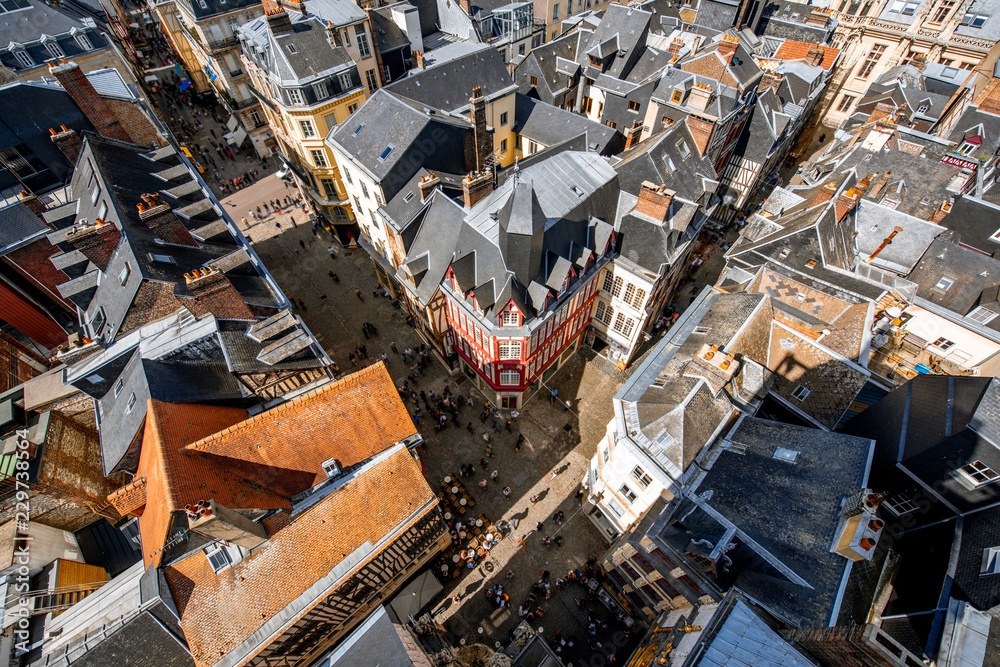 Top view on the rooftops of the old town of Rouen city during the sunny day in Normandy, France