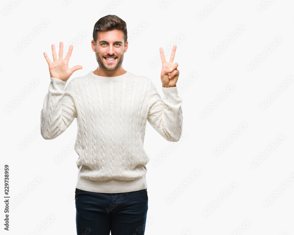 Young handsome man wearing winter sweater over isolated background showing and pointing up with fingers number seven while smiling confident and happy. Young handsome man wearing winter sweater over isolated background showing and pointing up with fingers number seven while smiling confident and happy.