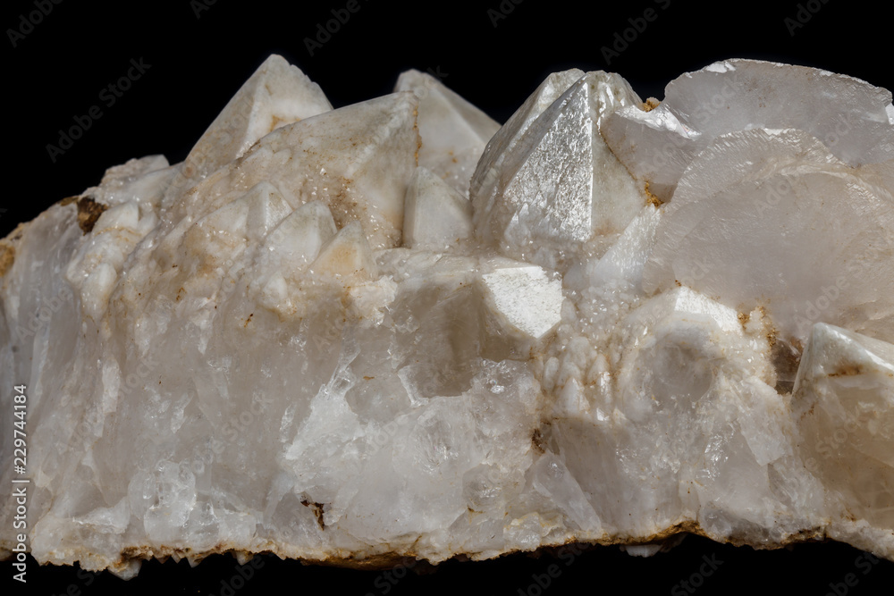 Macro mineral stone Snow quartz with calcite on a black background Macro mineral stone Snow quartz with calcite on a black background