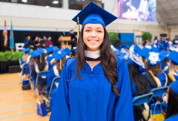 portrait of young woman at graduation ceremony