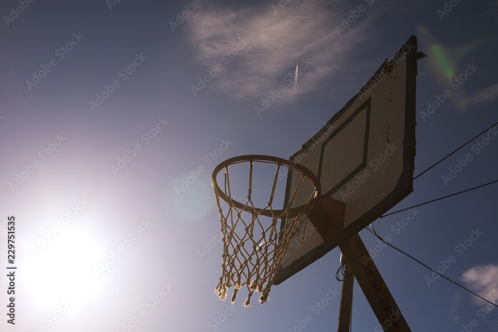 basketball hoop on background of blue sky basketball hoop on background of blue sky