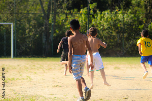 children playing soccer