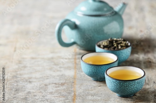 Porcelain chinese cups, steel teaspoon