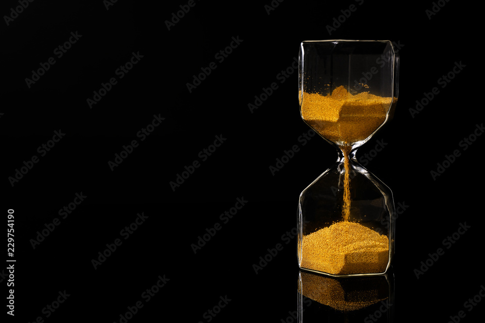 Hourglass on black background Hourglass on black background