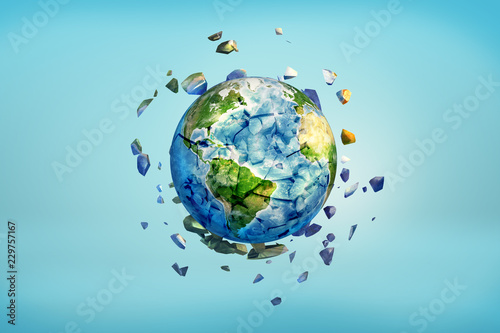 Fototapeta Naklejka Na Ścianę i Meble -  3d rendering of Earth globe getting crushed into small pieces with the cracked parts flying away.