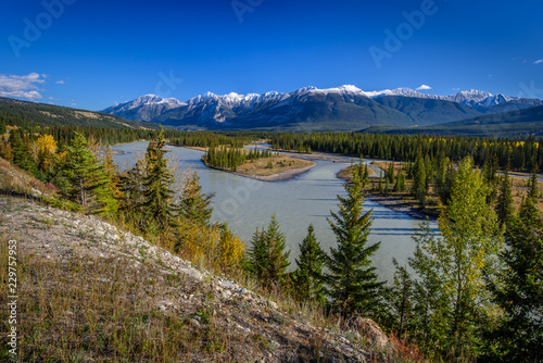 Fototapeta Naklejka Na Ścianę i Meble -  Beautiful River View in British Columbia over the mountains covered with clouds