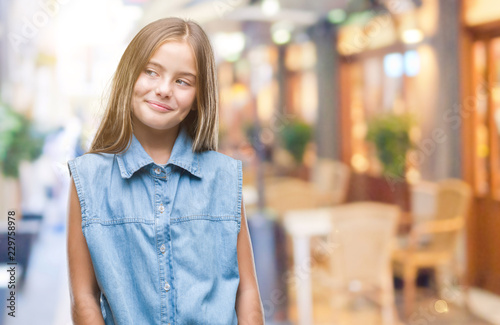 Young beautiful girl over isolated background smiling looking side and staring away thinking. Free Download Young beautiful girl over isolated background smiling looking side and staring away thinking. - GFXLoad