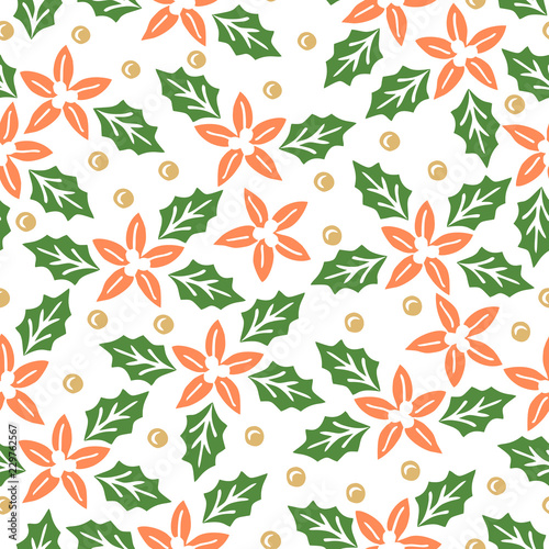 Seamless pattern with red and green christmas plants .