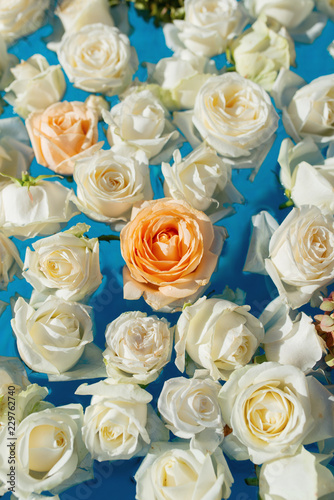 The pool filled with white rose flowers. Wedding decor