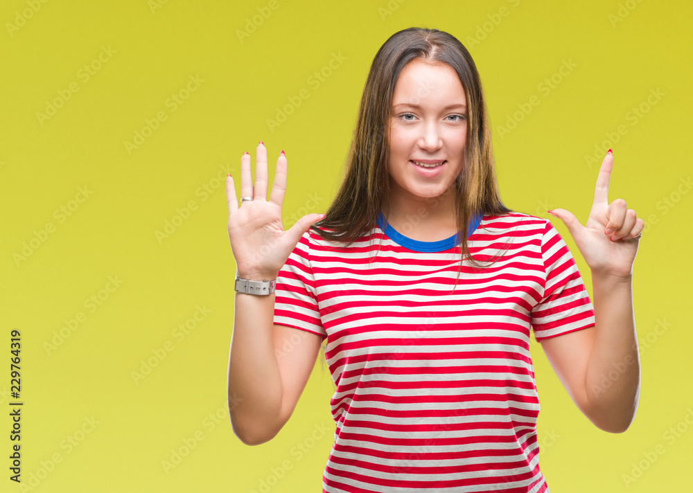 Young caucasian beautiful woman over isolated background showing and pointing up with fingers number seven while smiling confident and happy. Young caucasian beautiful woman over isolated background showing and pointing up with fingers number seven while smiling confident and happy.