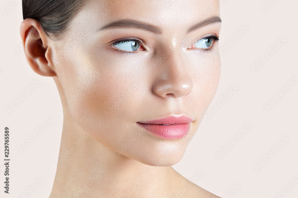Young beautiful woman with clean perfect skin close-up Young beautiful woman with clean perfect skin close-up