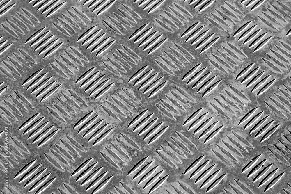 Metal sheet with notches as an abstract background Metal sheet with notches as an abstract background