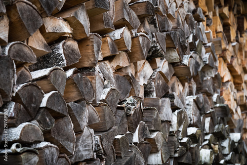 Firewood stacks with old and new woods. Natural colors