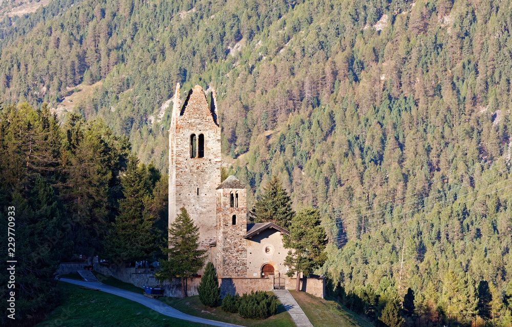 Sunset at San Gian church with its ruined bell tower near Celerina/St. Moritz, Switzerland