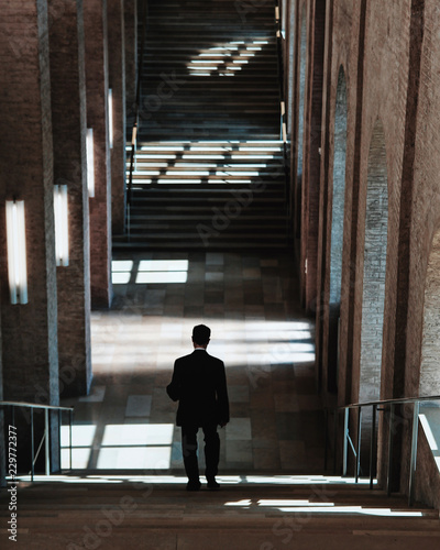 man coming down the stairs
