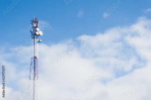 Mobile communication tower blurred background copy space