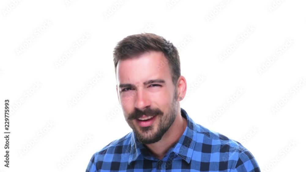 Annoyed displeased young man misunderstand looking at camera in disbelief isolated on white background. Annoyed displeased young man misunderstand looking at camera in disbelief isolated on white background.