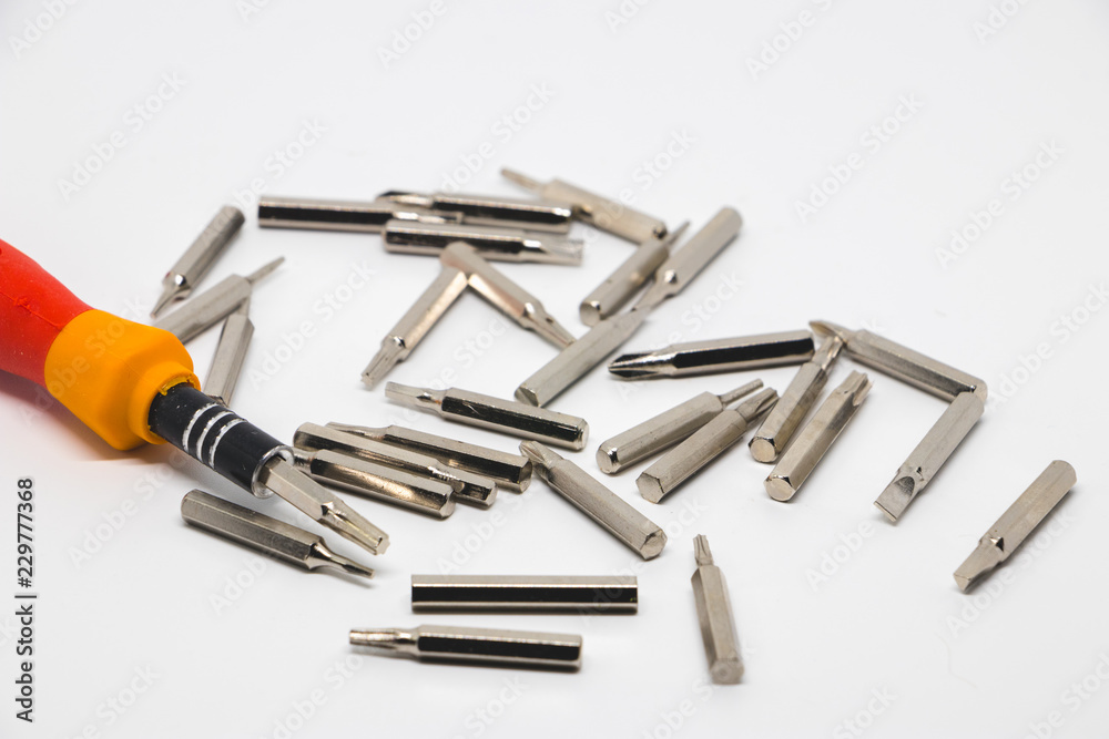 Screwdriver tips in a white background. The screwdriver bit set in tools. Screwdriver tips in a white background. The screwdriver bit set in tools.