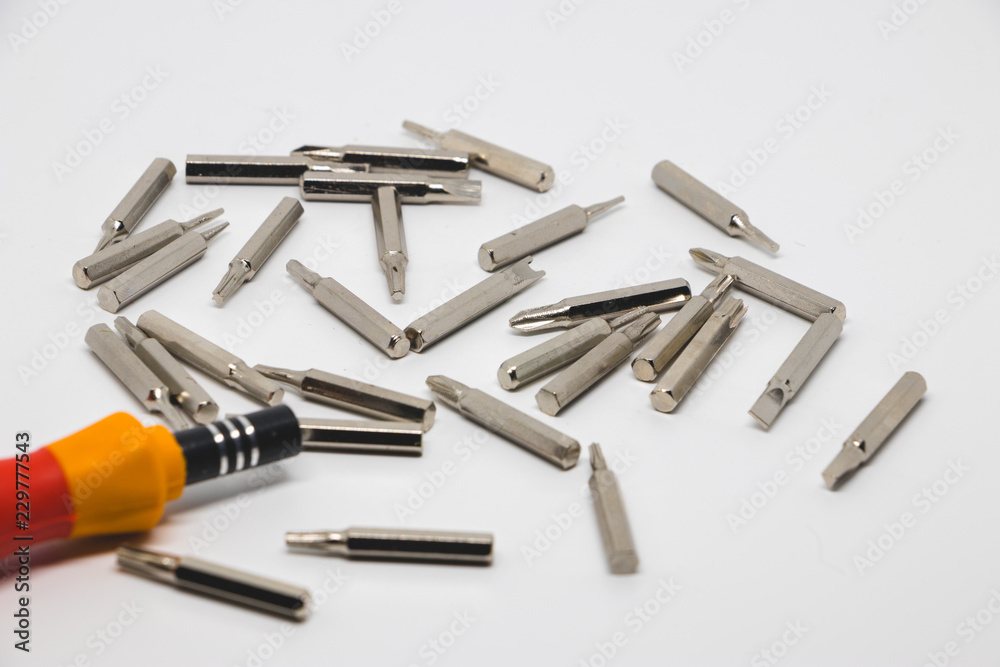 Screwdriver tips in a white background. The screwdriver bit set in tools. Screwdriver tips in a white background. The screwdriver bit set in tools.