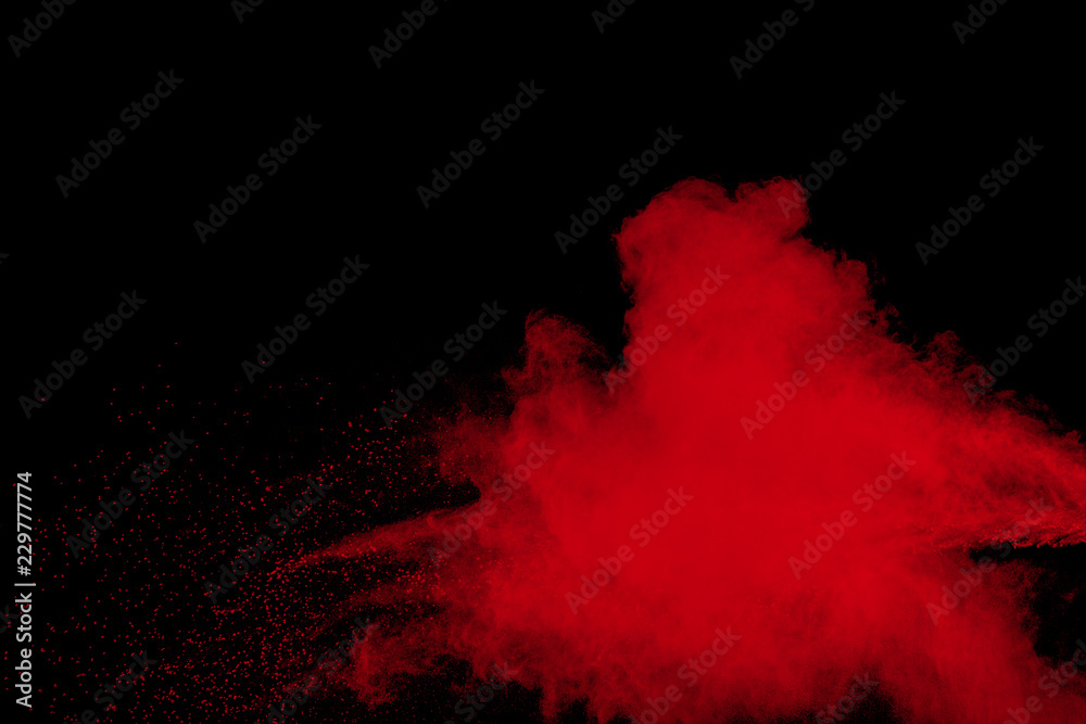 red color powder explosion cloud  on black background