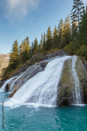 Waterfall in Tracy Arm fjord near Juneau Alaska photo