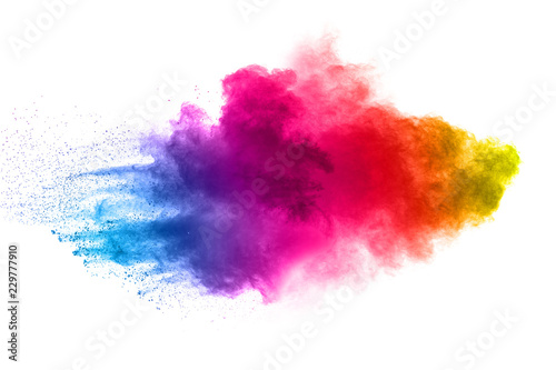 Multi color powder explosion on white background.