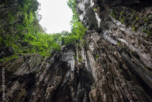Canvas Print Inside of Batu Caves, Malaysia - Sunlight coming through the hole in Batu Caves Kuala Lumpur