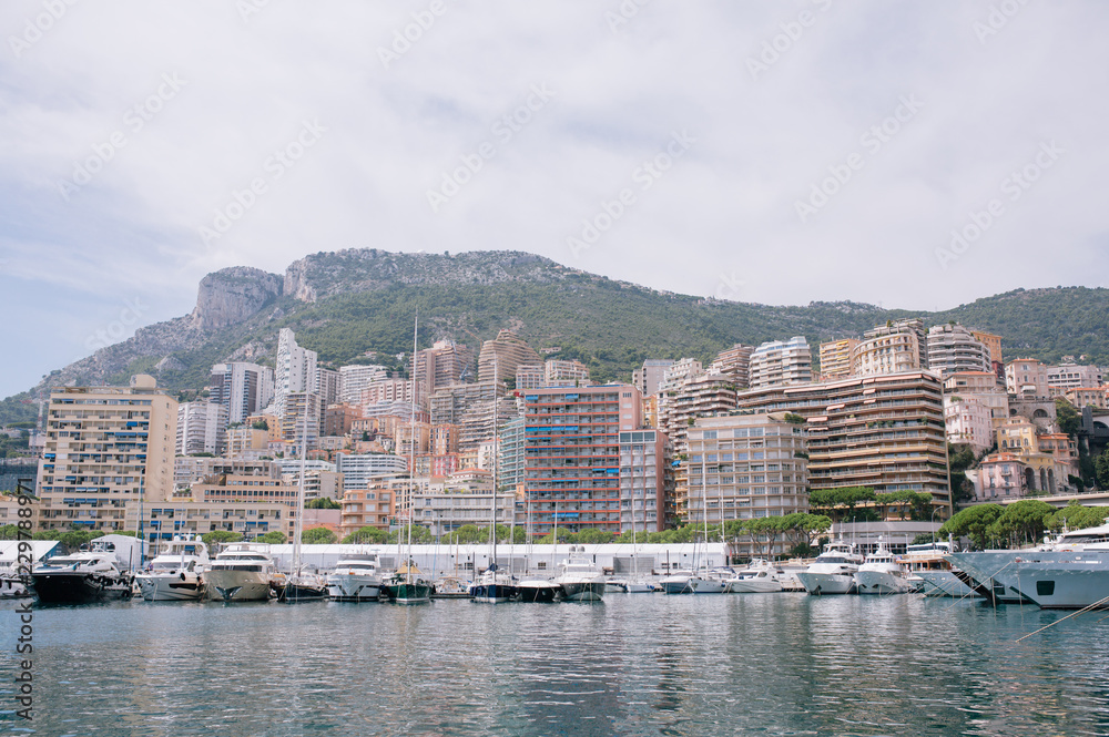 Yachts and ships in the port of Monaco in summer solar Europe