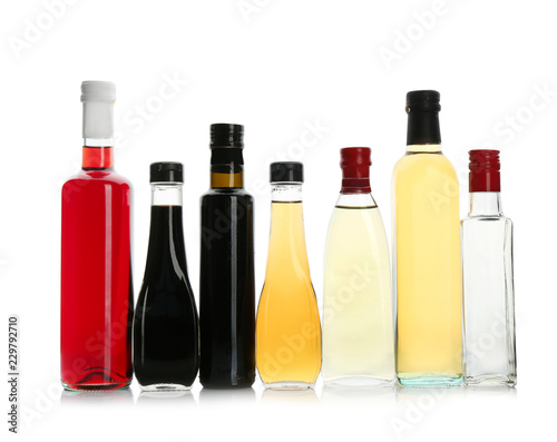 Wallpaper Mural Bottles with different kinds of vinegar on white background Torontodigital.ca