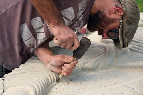 A sculptor is working