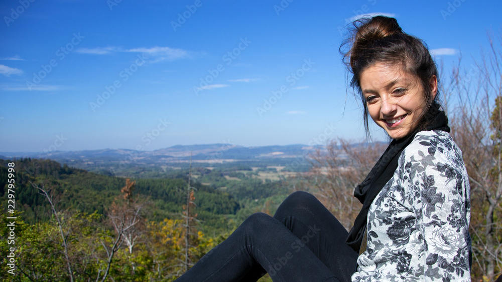 beautiful arabic girl smile to camera in Germany with landscape background