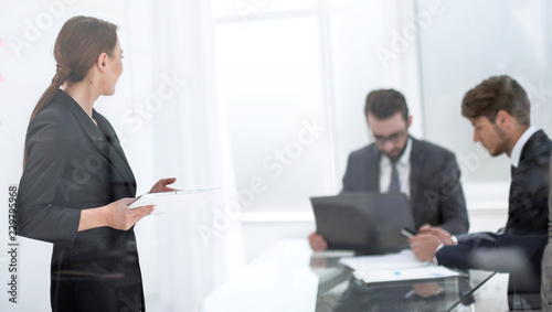 young employee explaining his new ideas