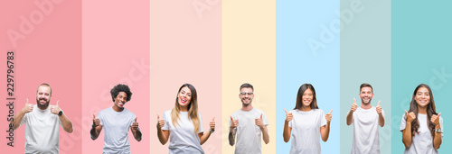 Collage of different ethnics young people wearing white t-shirt over colorful isolated background success sign doing positive gesture with hand  thumbs up smiling and happy. Looking at the camera